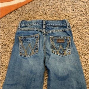 Boys size 6 wrangler retro jeans.